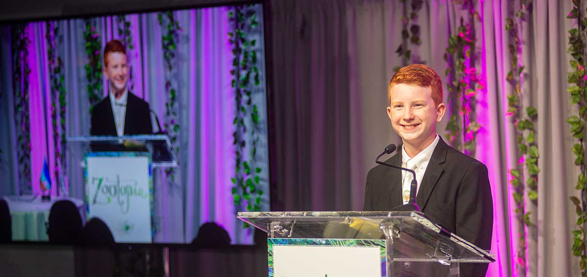 Young Conservationist award winner at podium