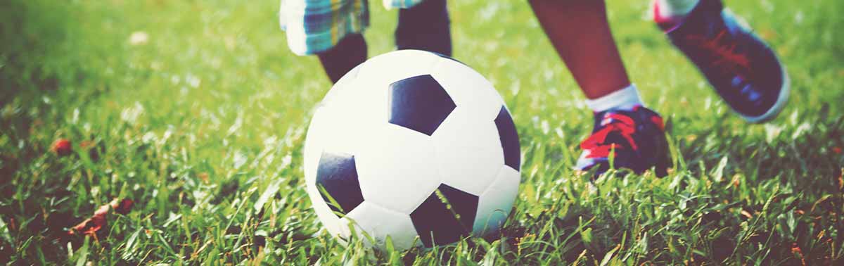 children playing soccer
